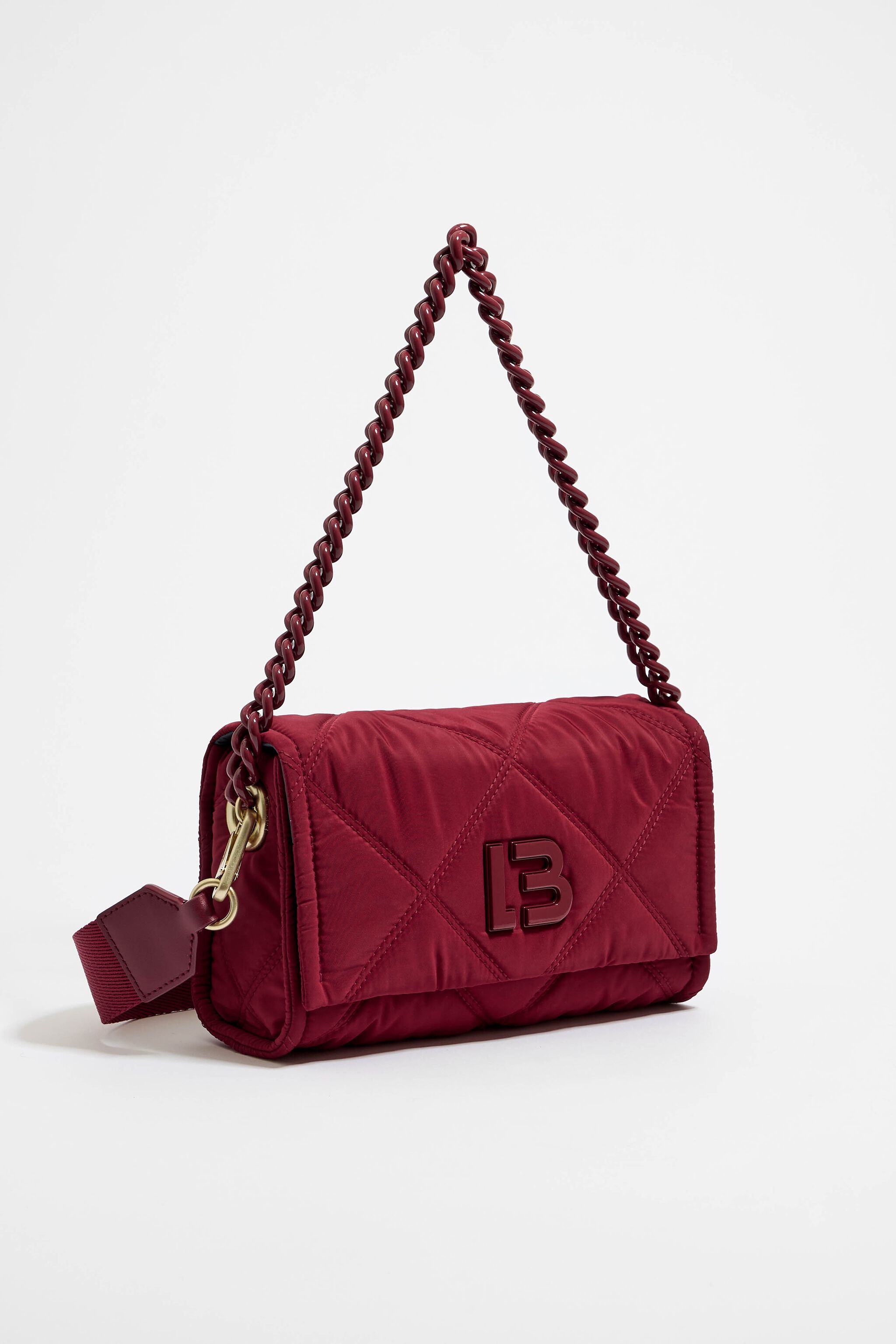 Red quilted leather handbag sale