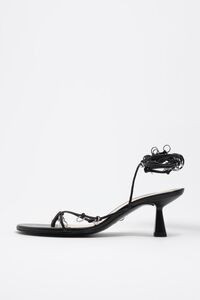 Black leather heeled sandal with piercings