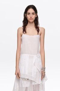 White embroidered top with asymmetrical handkerchief hem