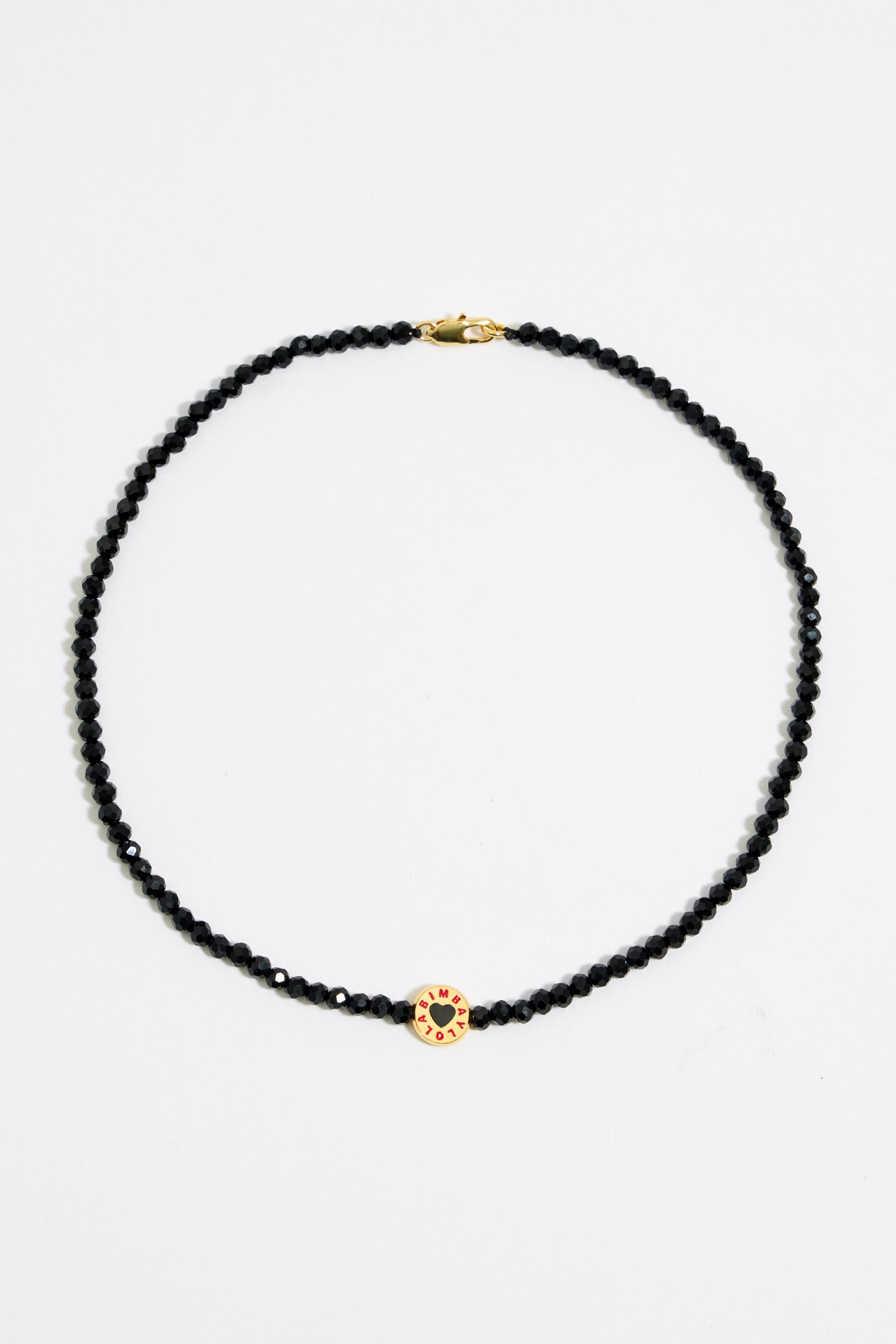 Red best sale black necklace