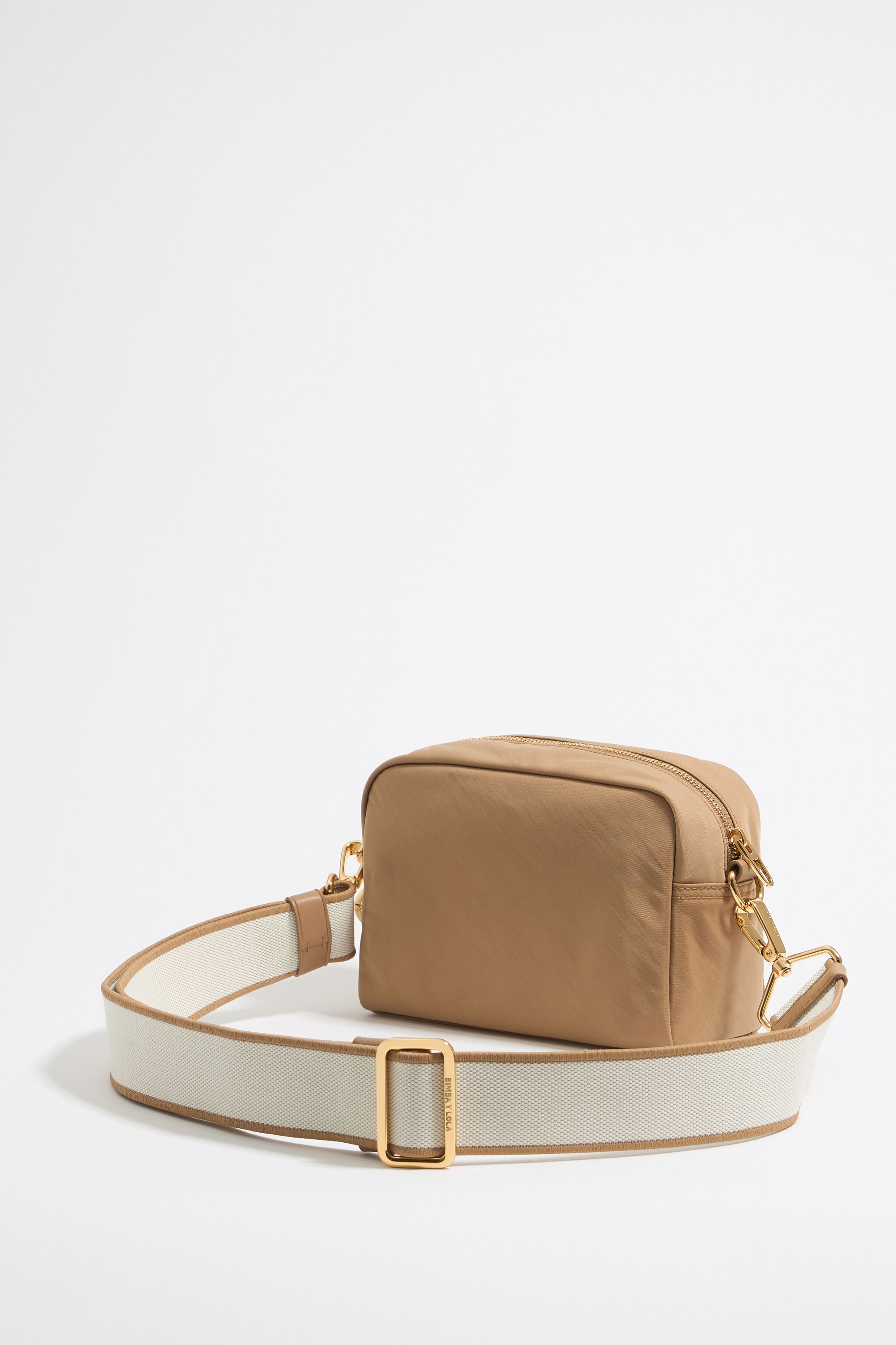 Small tan nylon crossbody bag