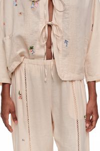 Wide white linen trousers with lace and mini embroidery