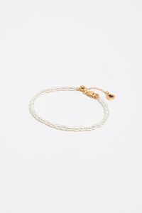 Golden chain and pearls bracelet