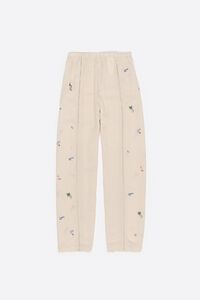 Wide white linen trousers with lace and mini embroidery