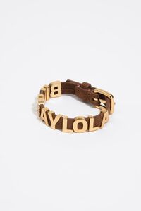 Gold logo bracelet with brown suede strap