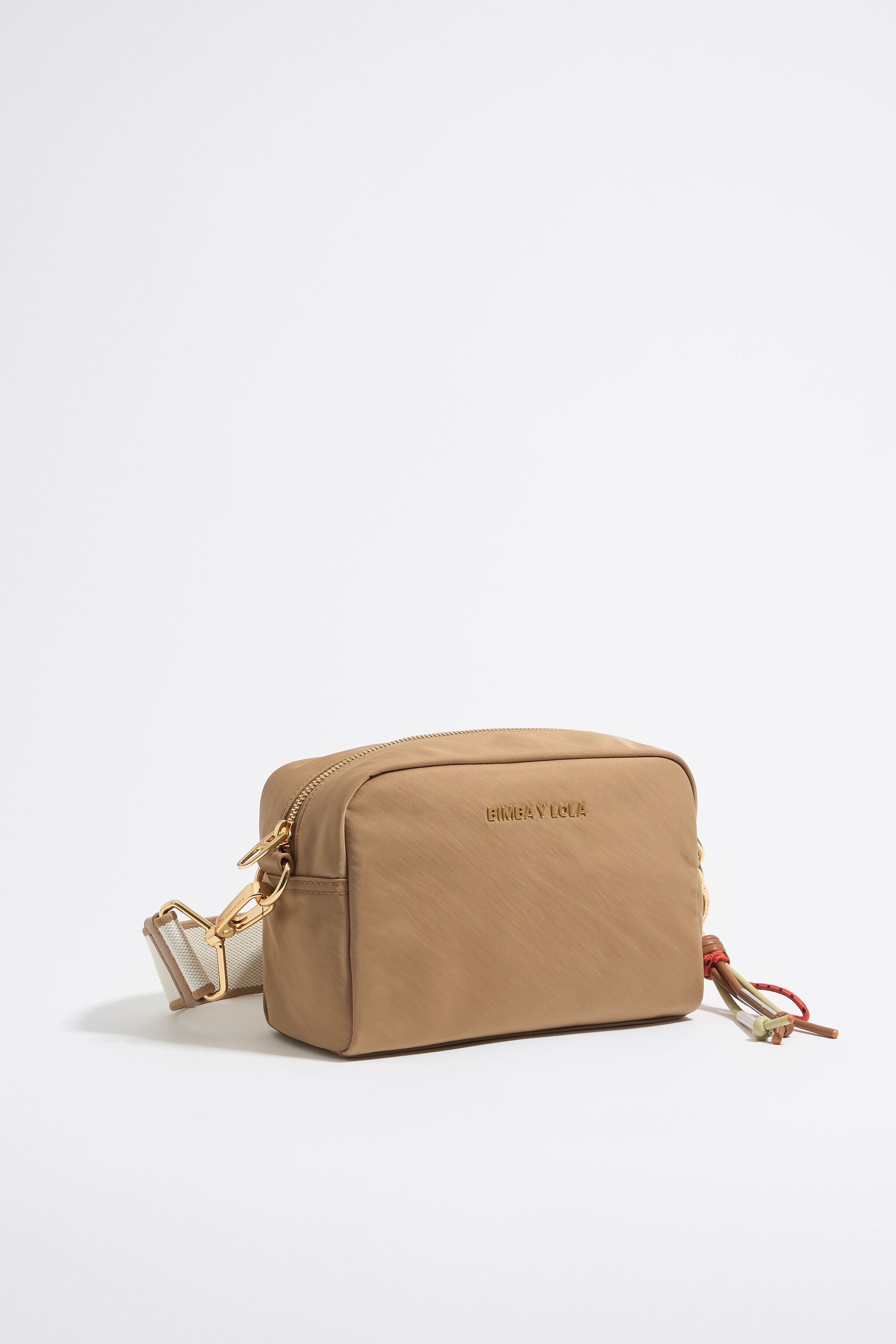 Small tan nylon crossbody bag