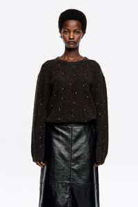 Dark gray boxy sweater with rivets