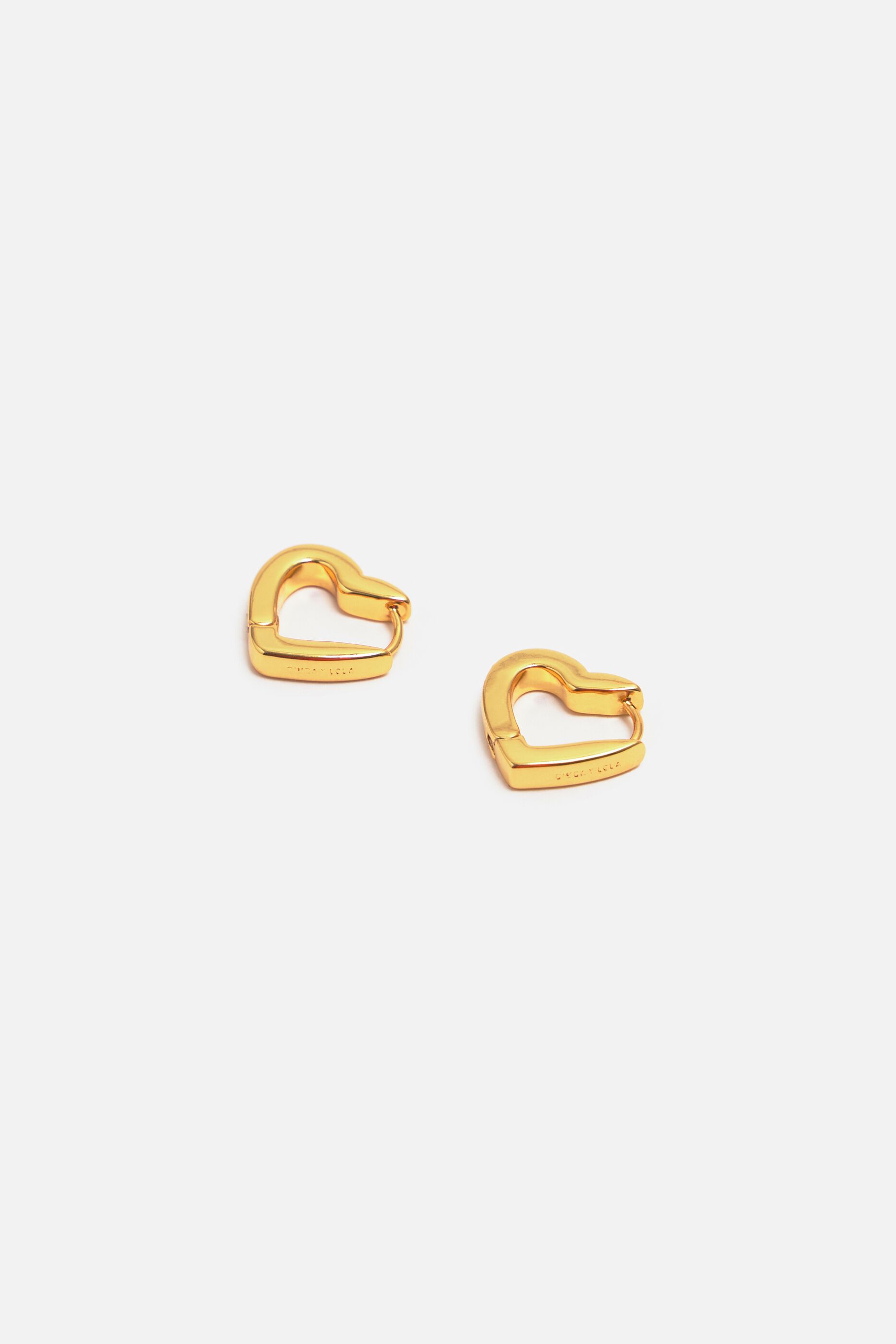 Gold heart on sale shaped hoop earrings