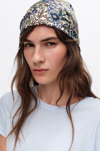Sand-colored floral scarf with logo frame