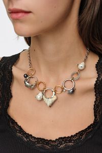 Chain necklace with horse rings