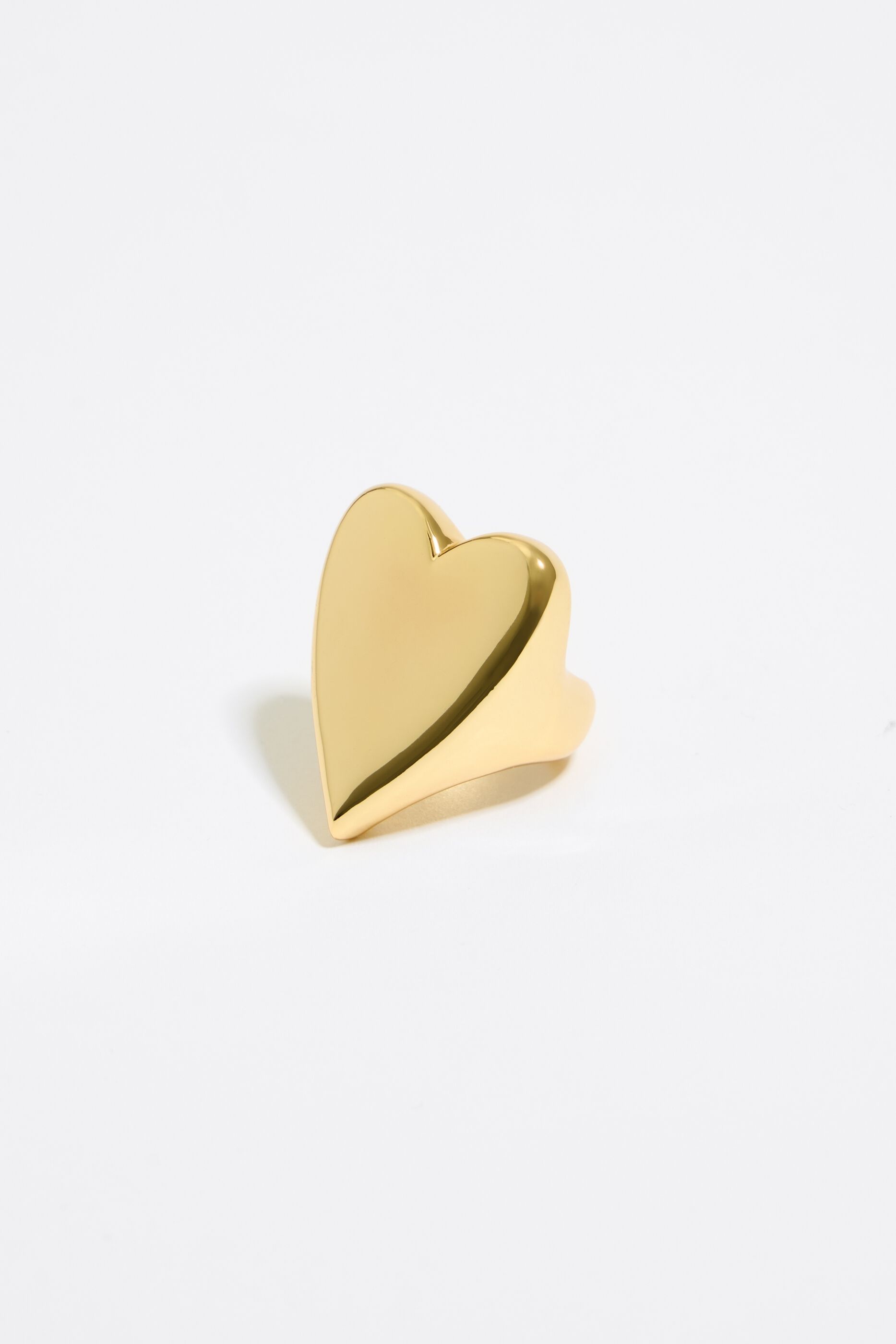 Gold ring with new arrivals heart shape