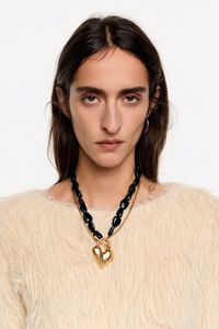 Double chain necklace with matte gold padlock heart