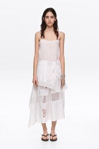 White embroidered skirt with asymmetrical handkerchief hem