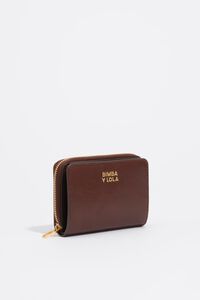 Dark tan leather flap purse