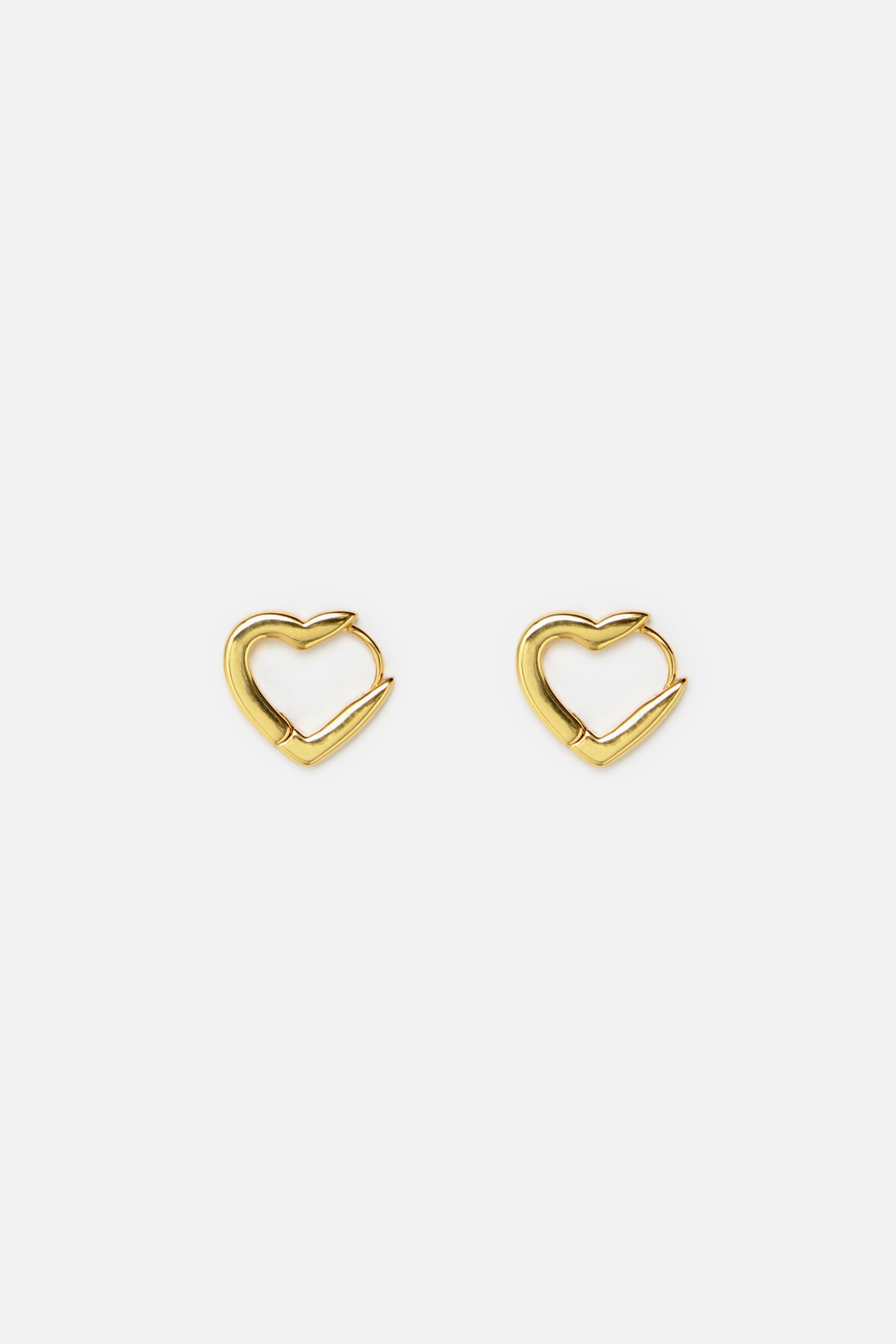 Gold heart earrings top
