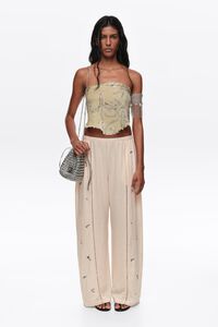 Wide white linen trousers with lace and mini embroidery