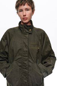 Waxed khaki A-line trench coat