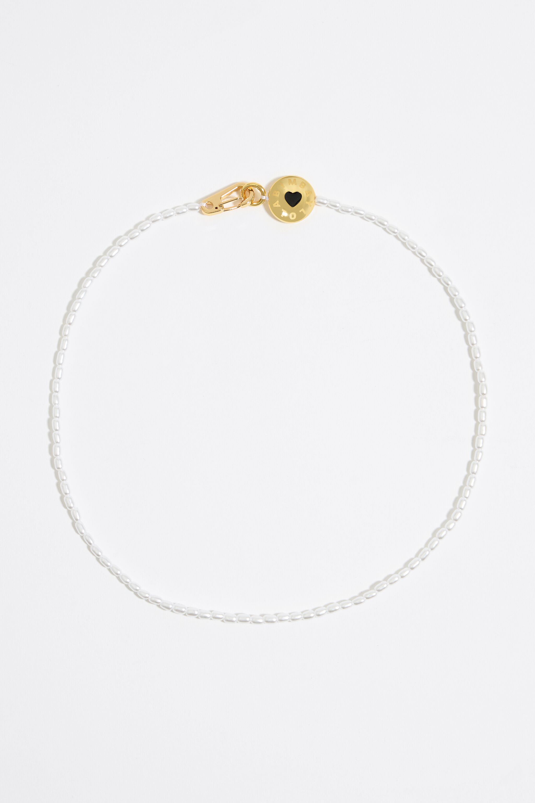 White pearl necklace with Candy logo