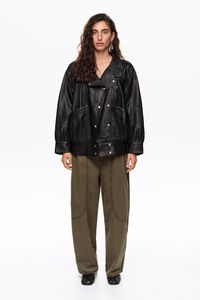 Black leather jacket with volume