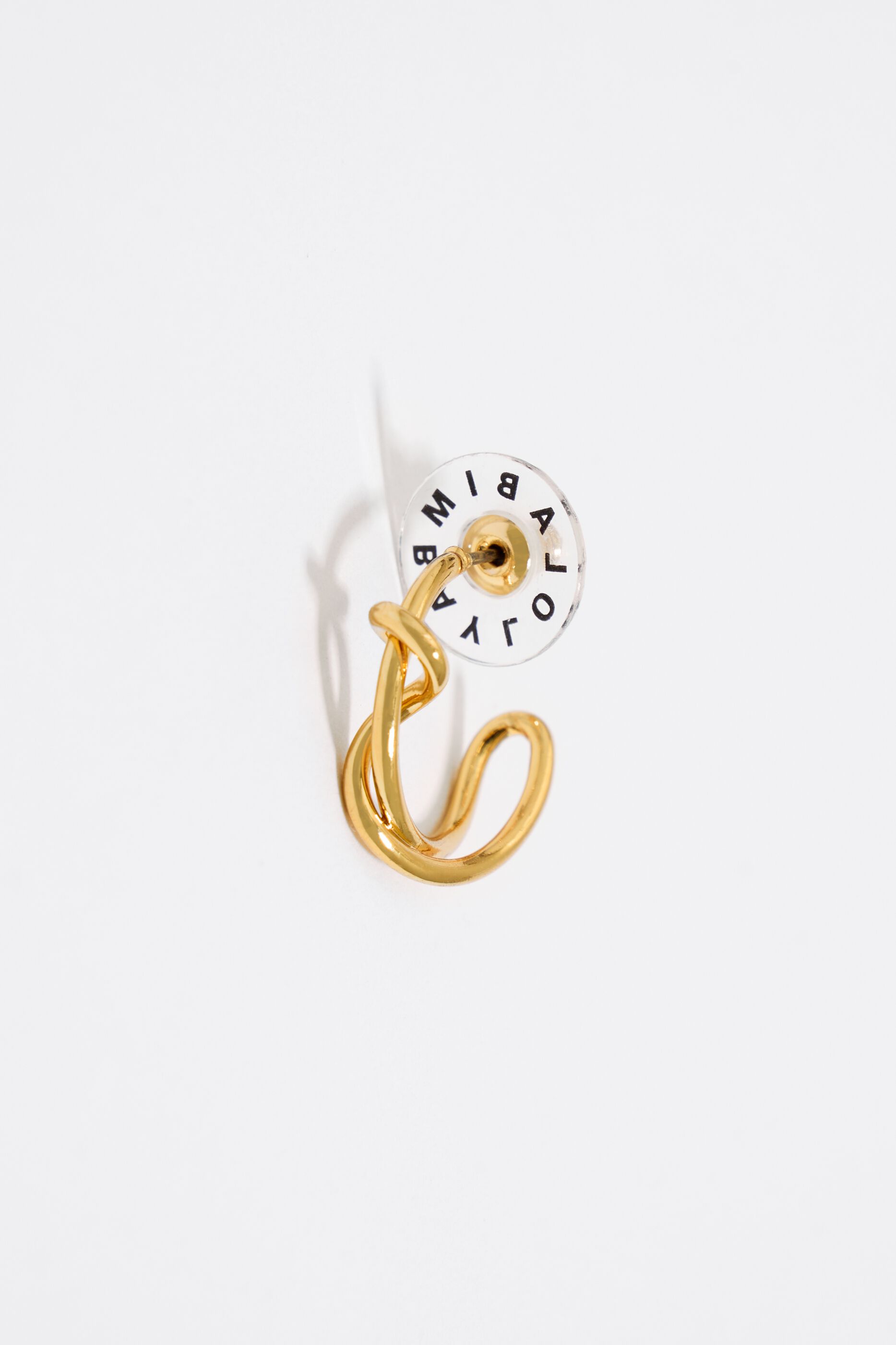 Gold knot hoop discount earrings