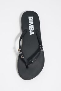 Black flip-flop with piercings