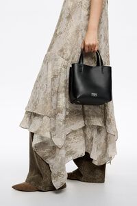 Small black leather Chihuahua bag