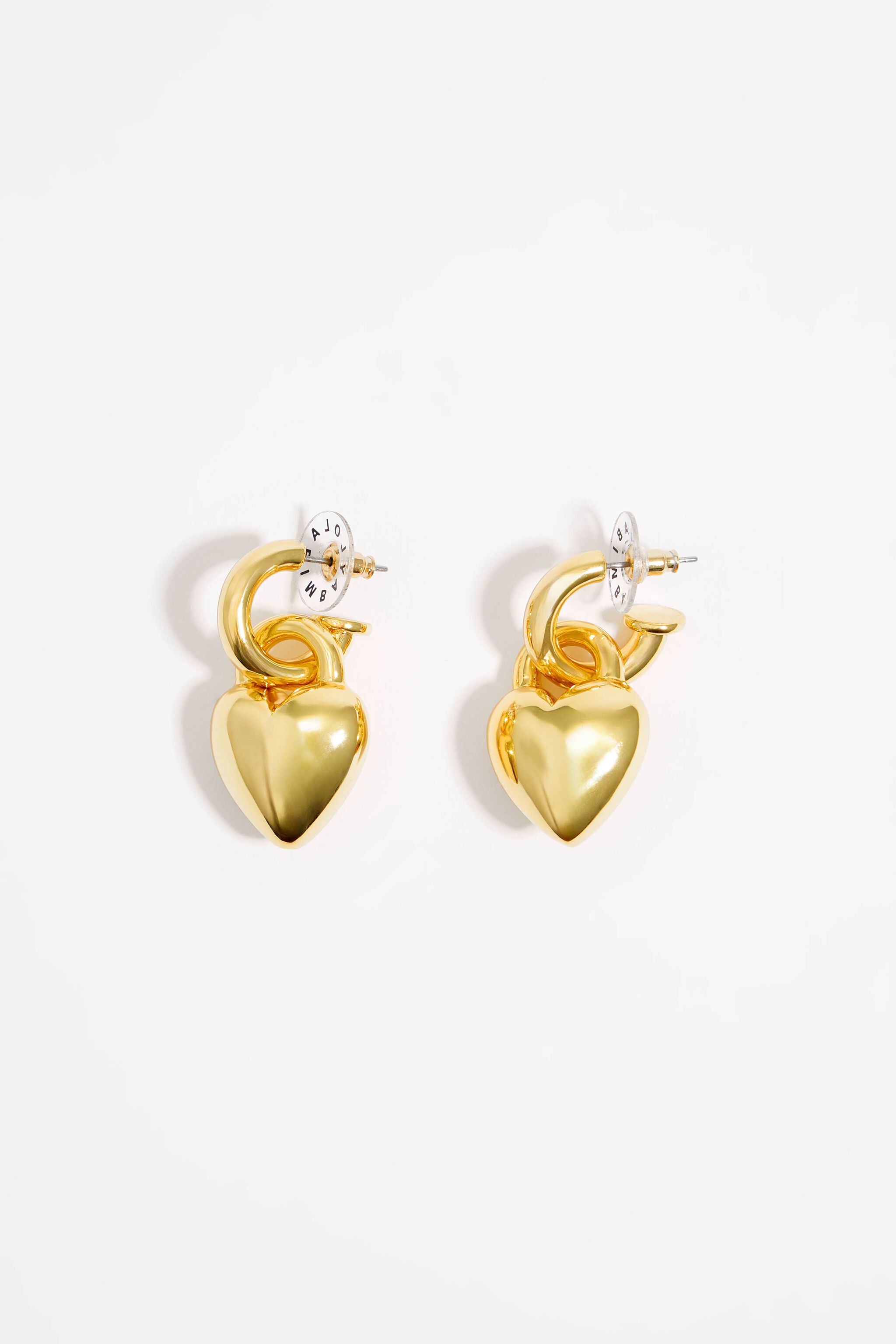 Gold heart on sale shaped hoop earrings