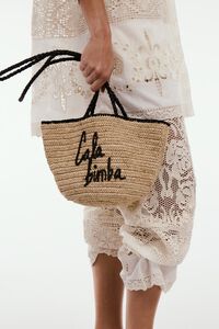 Small natural raffia basket bag