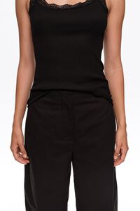 Black barrel trousers with decorative stitching