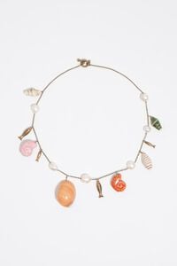 Aged gold necklace with fish and shells