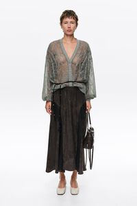 Faded black fluid skirt with lace ruffles