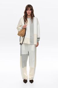 Ivory cotton patchwork jogger trousers