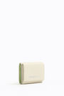 Ivory leather double flap purse Ivory leather double flap purse