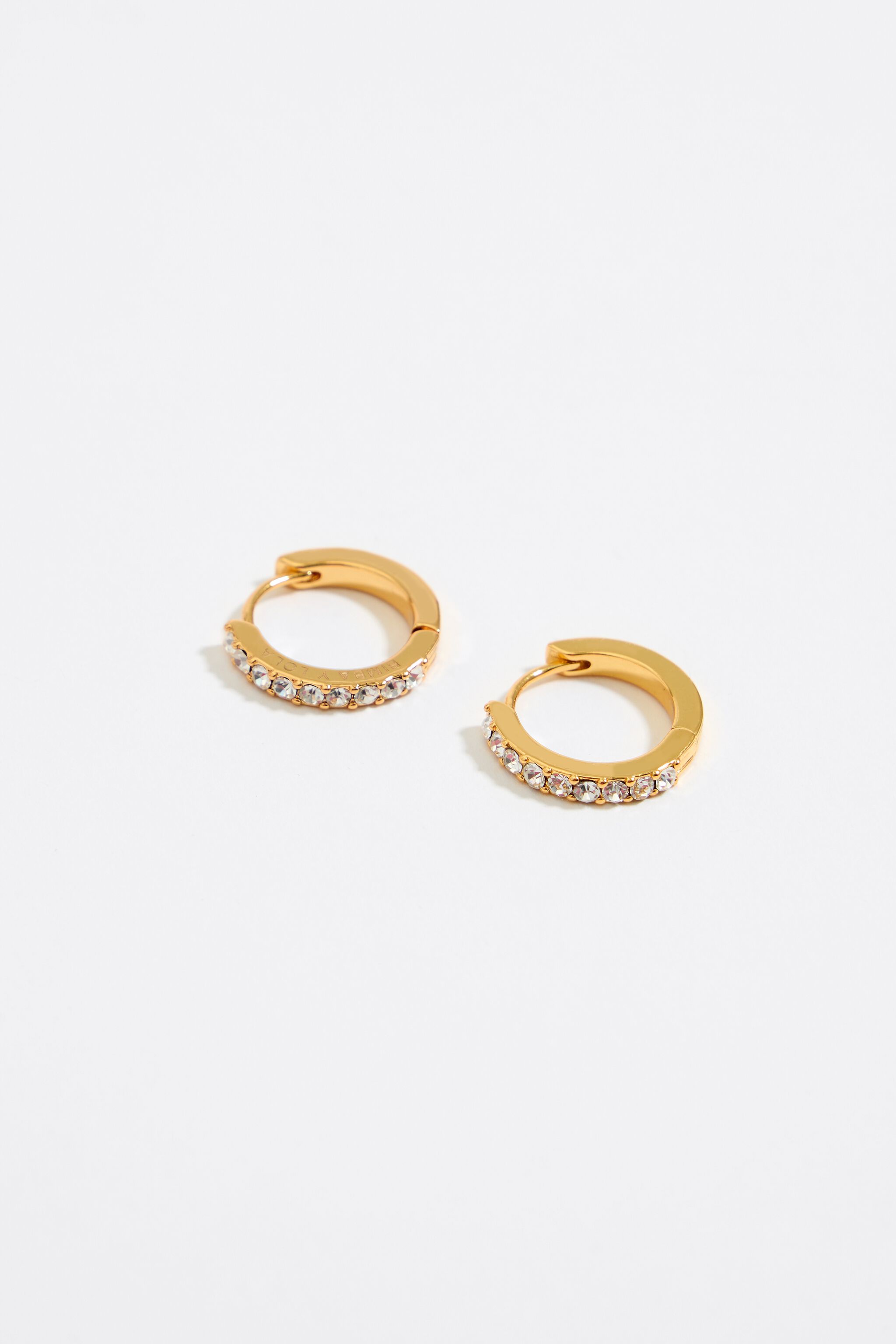 Gold loop earing top