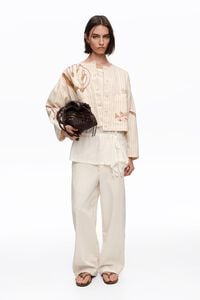 Ivory jacket with stitching and striped prints