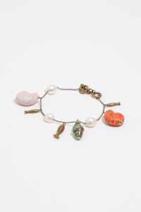 Aged gold bracelet with pearls, shells and fish