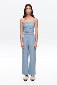 Blue striped jumpsuit with gathered straps
