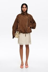 Ivory lace mini skirt