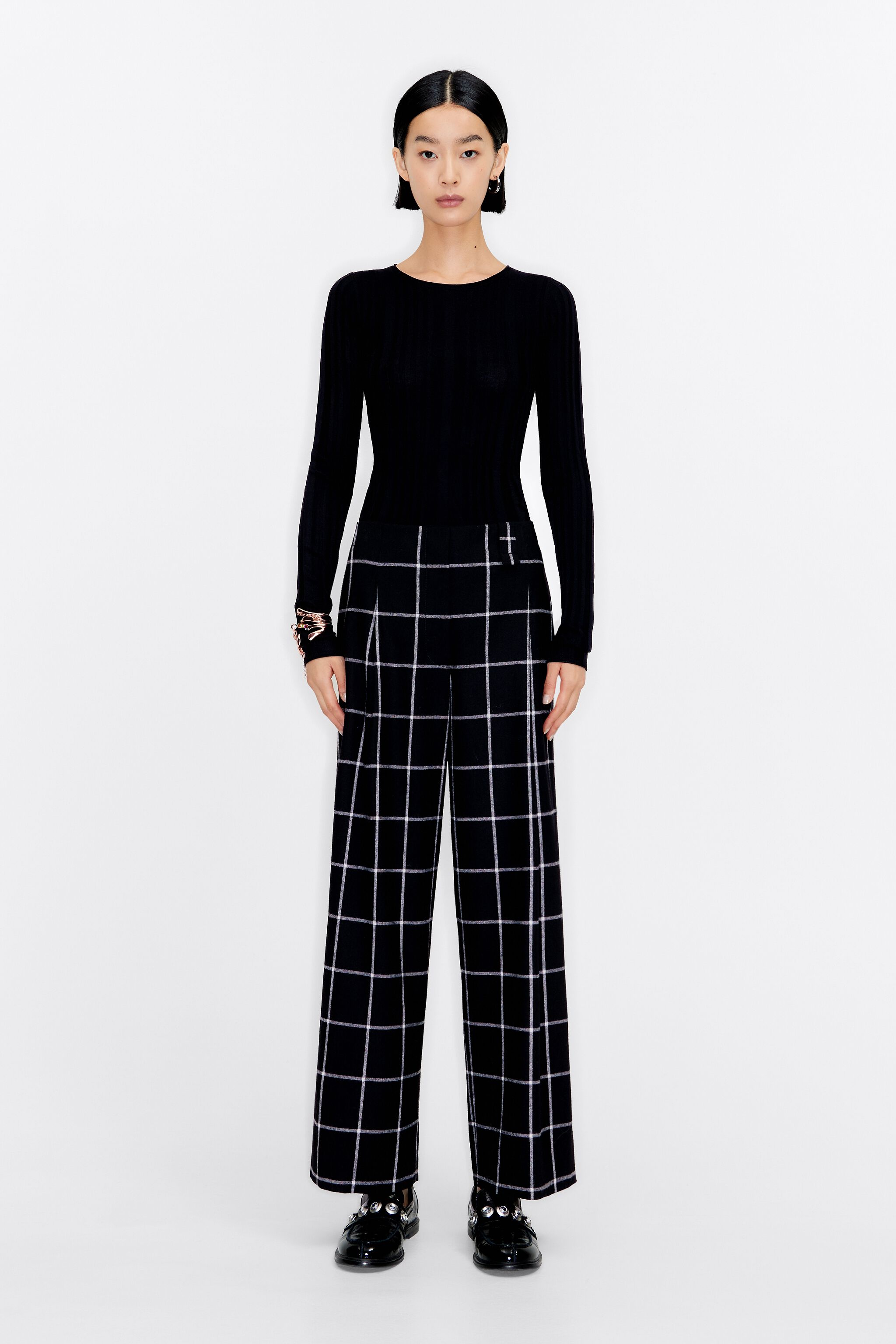 White and black best sale check trousers
